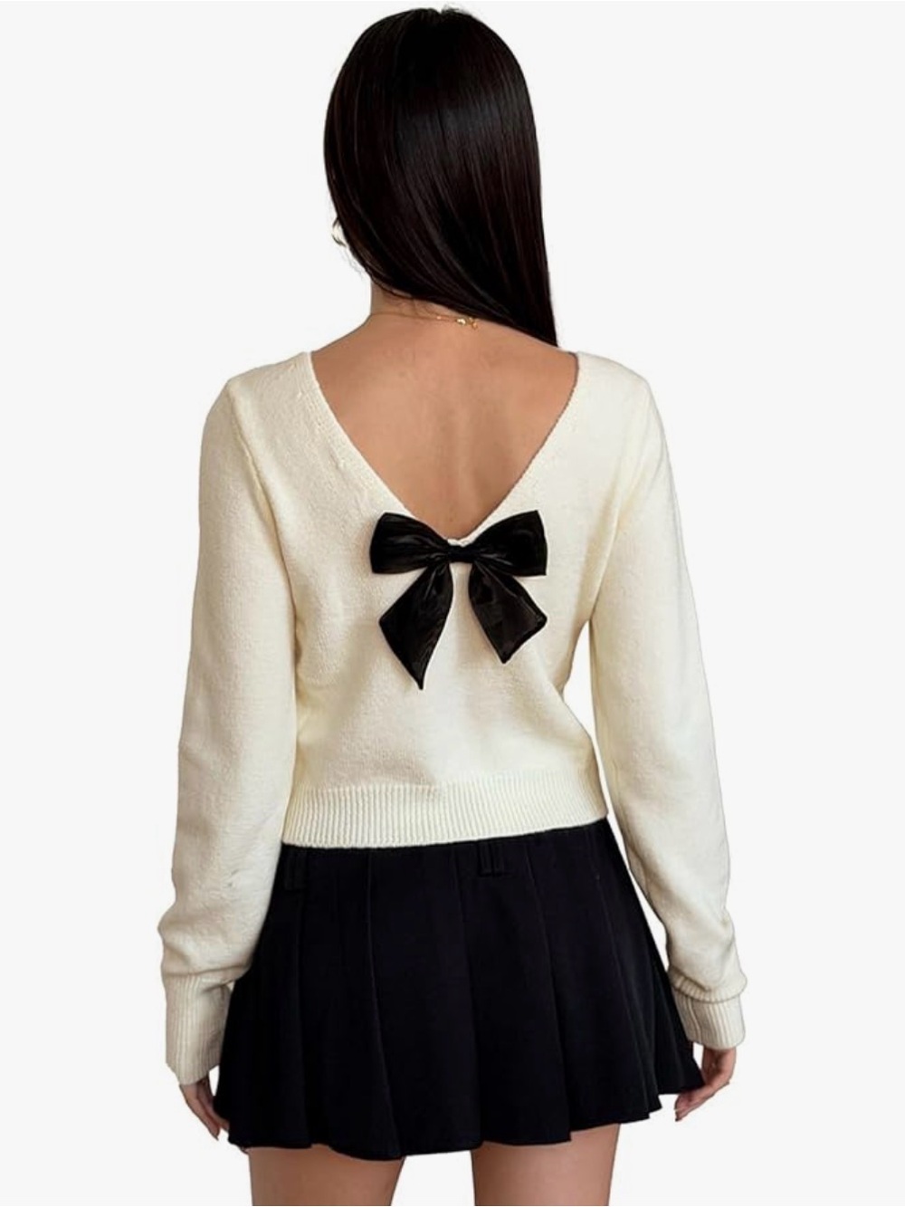 Cream V‑Back Sweater with Black Bow